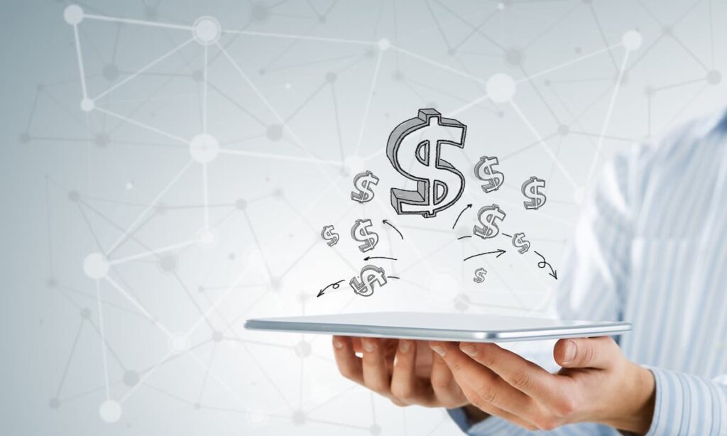 Tablet con simbolos de dinero