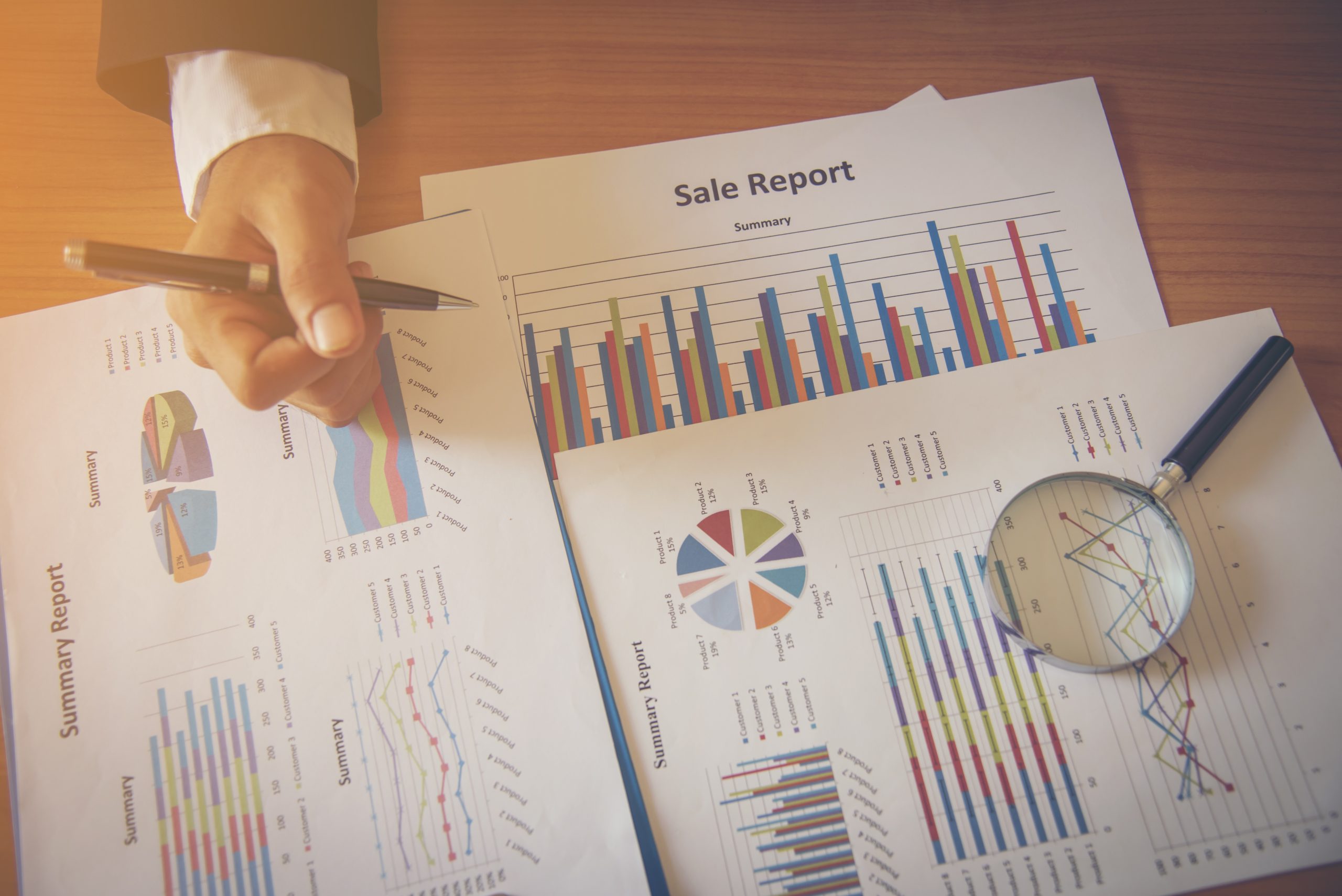 analyzing-sale-report-with-magnifying-glass-2026-03-26-22-49-31-utc